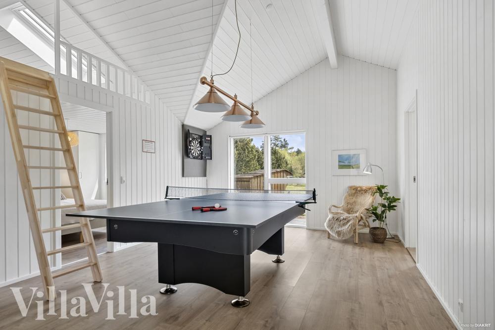 Neben den vielen schönen Stunden, die man im Poolbereich des Hauses verbringen kann, bietet das Luxusferienhaus 935 auch Spielevergnügen bei Billard/Tischtennis und Darts
