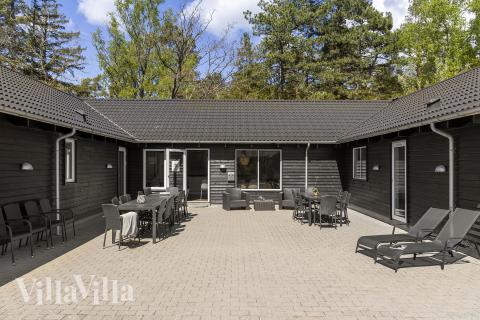 Genießen Sie einen Grillabend auf der Terrasse des Luxusferienhauses Nr. 351 in Nordseeland