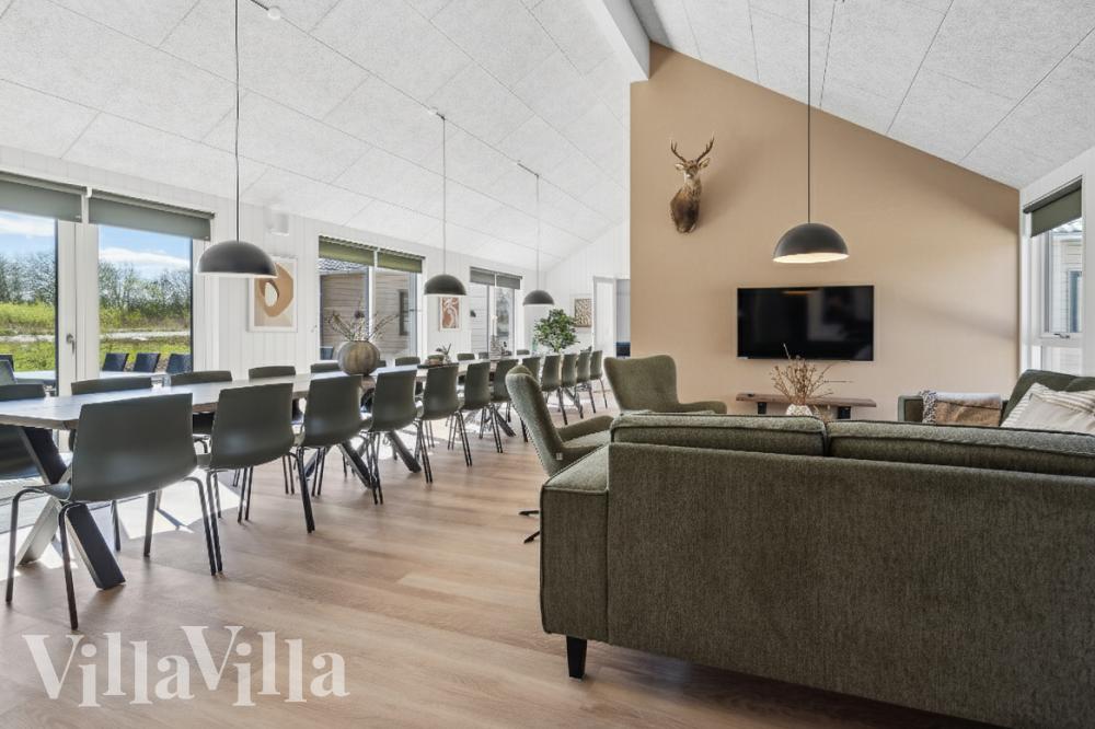 Die Couch im Luxusferienhaus Nr. 962 in Lolland/Falster/Mön lädt zu Gesellschaftsspielen oder zu Kinoabenden ein.
