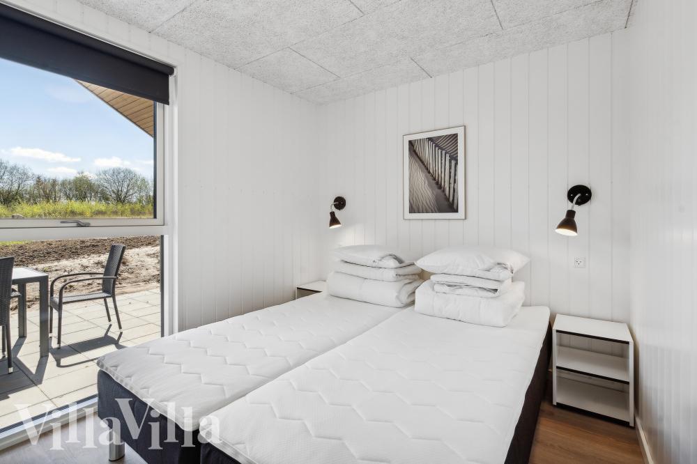 Eines der 9 Schlafzimmer im Luxusferienhaus Nr. 962