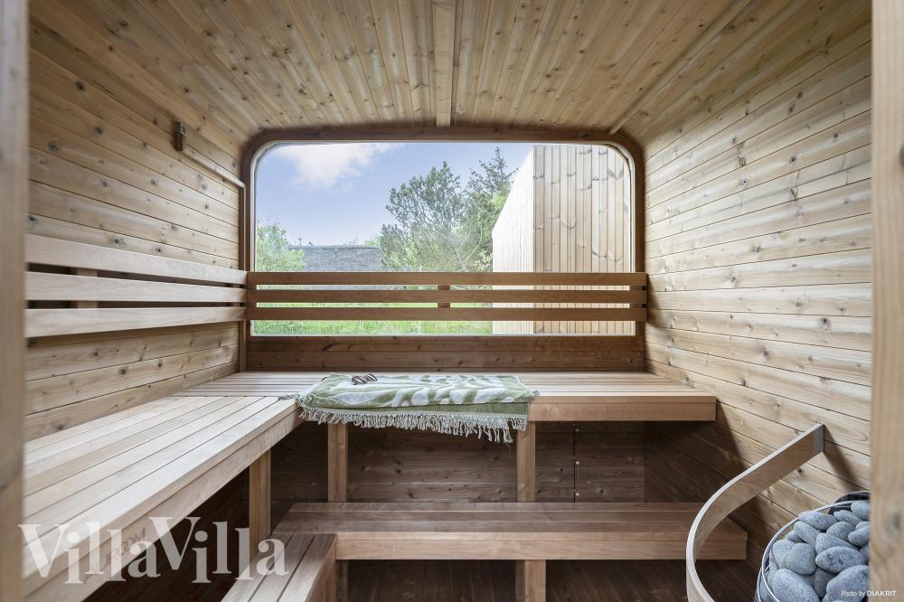 Genießen Sie die heiße Sauna im Luxusferienhaus Nr. 557 für 14 Personen