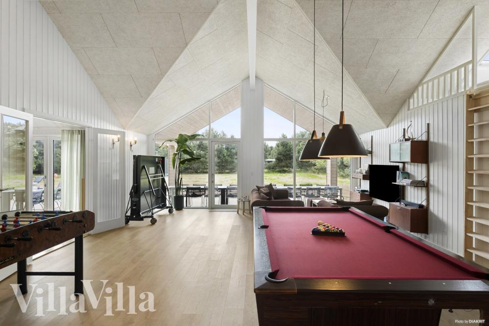 Das Luxusferienhaus 934 für 26 Personen hat einen großen Aktivitätsraum mit u. a. Billard und Darts