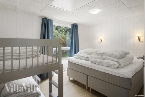 Eines der 9 Schlafzimmer im Luxusferienhaus Nr. 934
