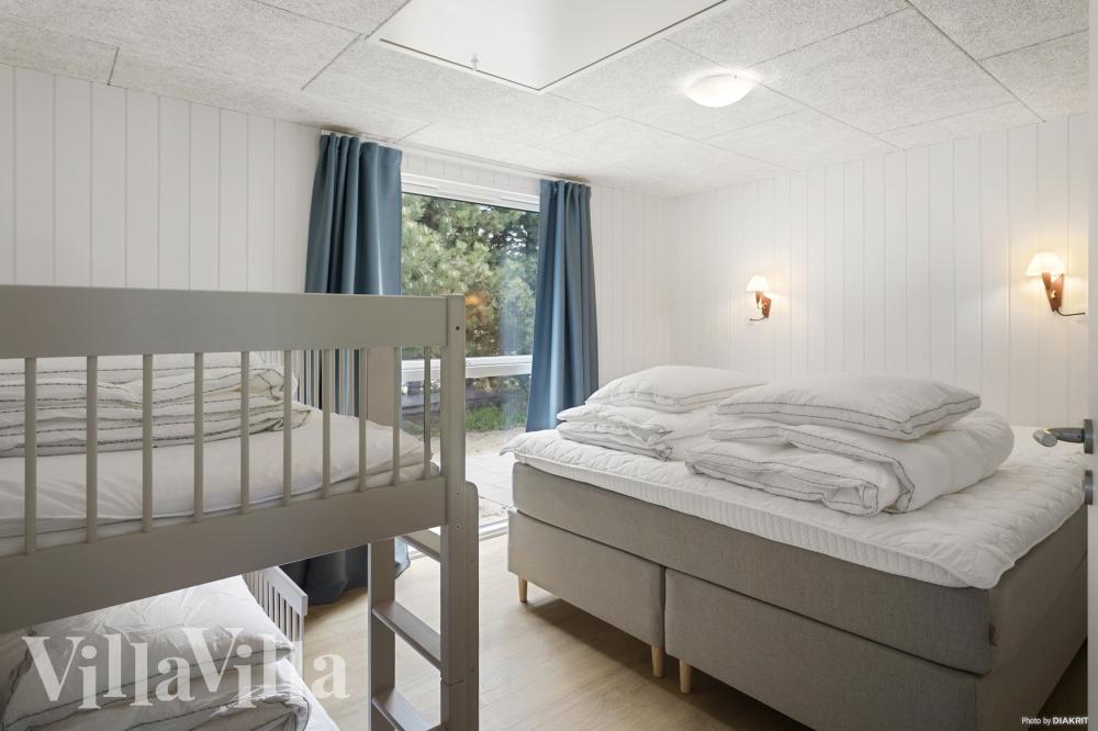 Eines der 9 Schlafzimmer im Luxusferienhaus Nr. 934