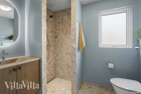 Eines der Badezimmer im Luxusferienhaus Nr. 934