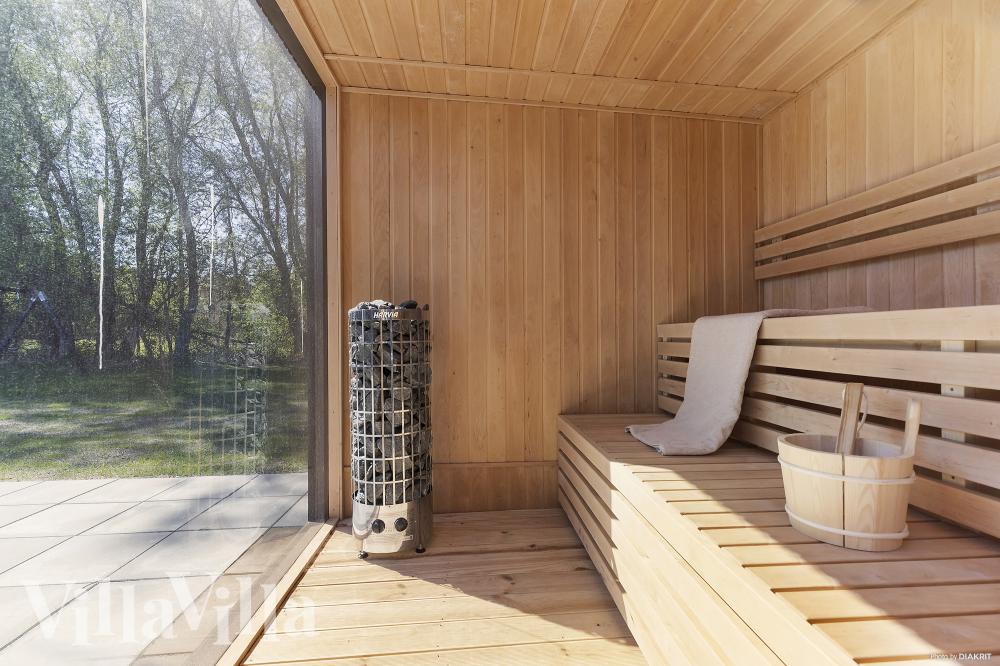 Genießen Sie die heiße Sauna im Luxusferienhaus Nr. 979 für 16 Personen