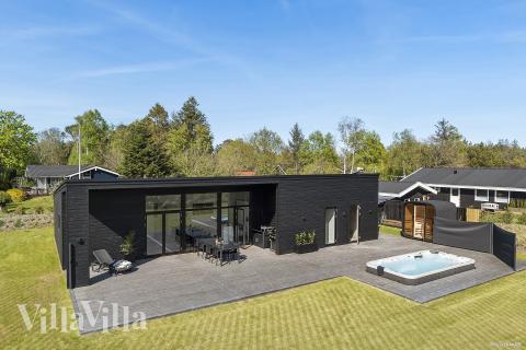 Diese schicke Haus mit Whirlpool Nr. 977 mit Platz für 10 Personen liegt in Nordjütland