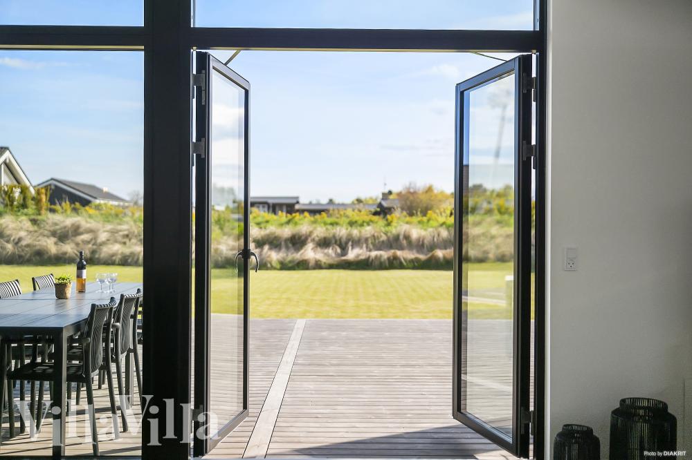 Genießen Sie einen Grillabend auf der Terrasse des Luxusferienhauses Nr. 977 in Nordjütland