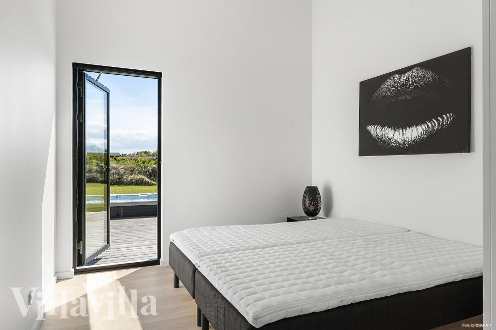 Eines der 5 Schlafzimmer im Luxusferienhaus Nr. 977