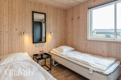 Eines der 7 Schlafzimmer im Luxusferienhaus Nr. 295