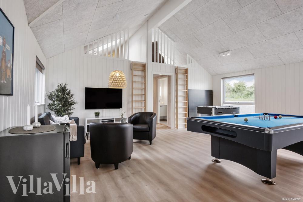 Neben den vielen schönen Stunden, die man im Poolbereich des Hauses verbringen kann, bietet das Luxusferienhaus 922 auch Spielevergnügen bei Billard/Tischtennis und Darts