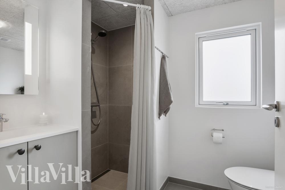 Eines der Badezimmer im Luxusferienhaus Nr. 922