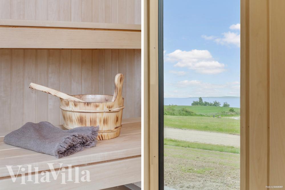 Genießen Sie die heiße Sauna im Luxusferienhaus Nr. 922 für 14 Personen