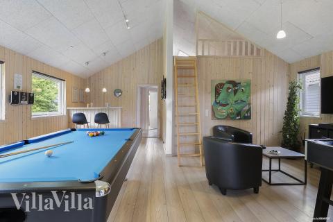 Neben den vielen schönen Stunden, die man im Poolbereich des Hauses verbringen kann, bietet das Luxusferienhaus 255 auch Spielevergnügen bei Billard/Tischtennis und Darts