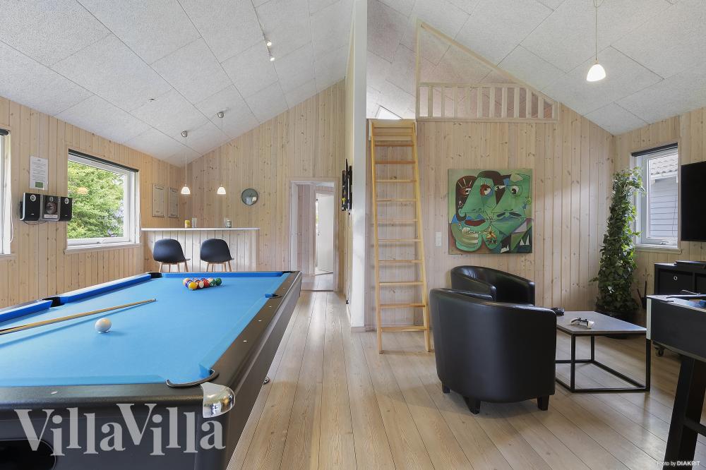 Neben den vielen schönen Stunden, die man im Poolbereich des Hauses verbringen kann, bietet das Luxusferienhaus 255 auch Spielevergnügen bei Billard/Tischtennis und Darts