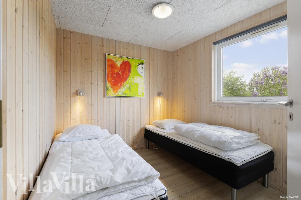 Eines der 7 Schlafzimmer im Luxusferienhaus Nr. 255