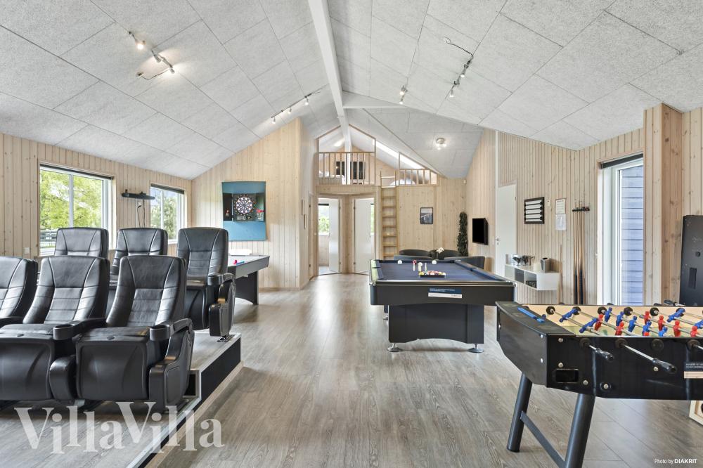 Neben den vielen schönen Stunden, die man im Poolbereich des Hauses verbringen kann, bietet das Luxusferienhaus 314 auch Spielevergnügen bei Billard/Tischtennis und Darts