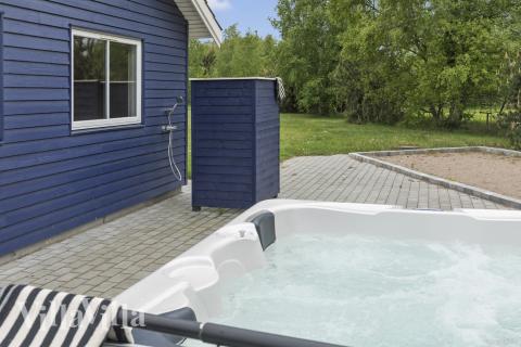 Genießen Sie den warmen Whirlpool im Luxusferienhaus Nr. 314 in Lolland/Falster/Mön