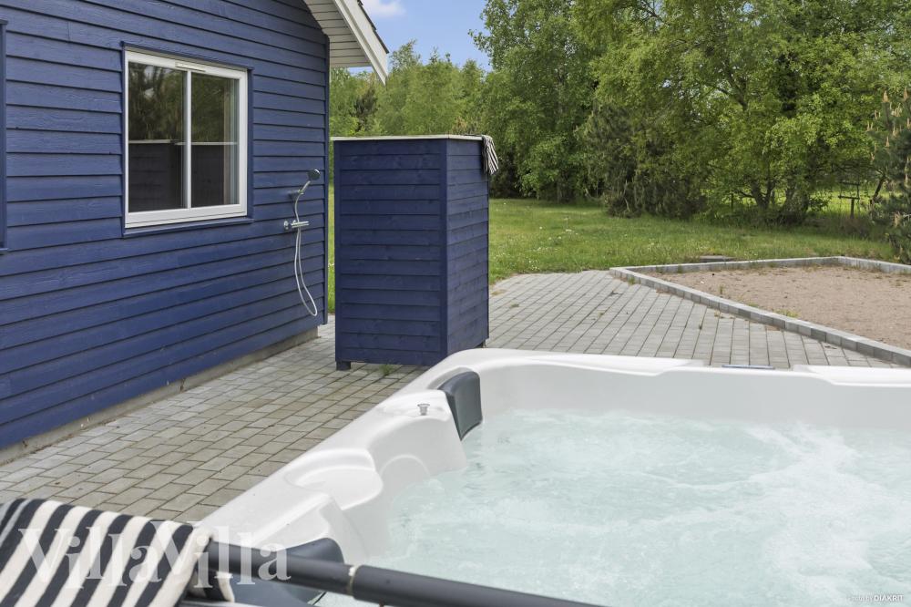 Genießen Sie den warmen Whirlpool im Luxusferienhaus Nr. 314 in Lolland/Falster/Mön