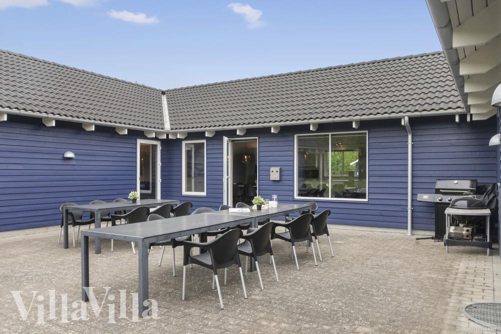 Genießen Sie einen Grillabend auf der Terrasse des Luxusferienhauses Nr. 314 in Lolland/Falster/Mön