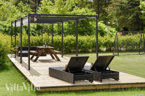 Genießen Sie einen Grillabend auf der Terrasse des Luxusferienhauses Nr. 964 in Ostjütland