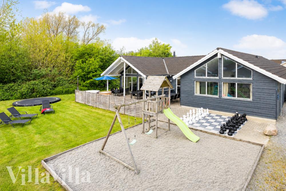 Dieses schöne Poolhaus Nr. 255 mit Platz für 18 Personen liegt in Südjütland