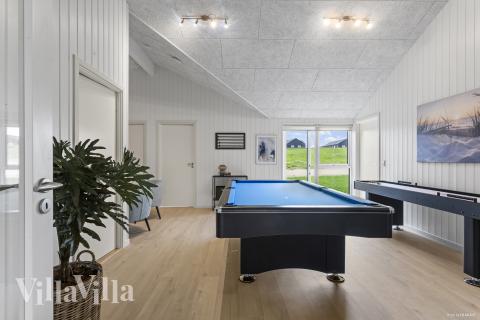 Neben den vielen schönen Stunden, die man im Poolbereich des Hauses verbringen kann, bietet das Luxusferienhaus 947 auch Spielevergnügen bei Billard/Tischtennis und Darts