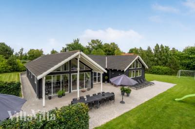 Dieses schöne Poolhaus Nr. 276 mit Platz für 18 Personen liegt in Nordseeland