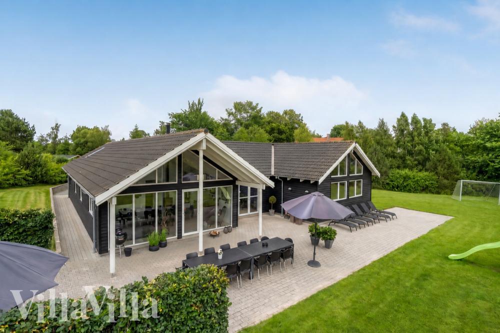 Dieses schöne Poolhaus Nr. 276 mit Platz für 18 Personen liegt in Nordseeland