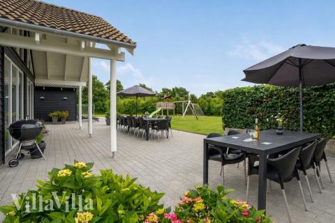 Das Luxusferienhaus Nr. 276 hat eine tolle Terrasse, die mit hochwertigen Gartenmöbeln für 18 Personen ausgestattet ist.