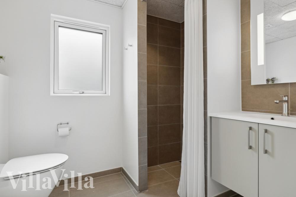 Eines der Badezimmer im Luxusferienhaus Nr. 961