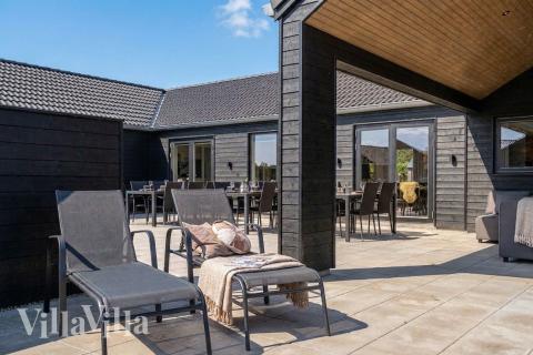 Das Luxusferienhaus Nr. 961 hat eine tolle Terrasse, die mit hochwertigen Gartenmöbeln für 30 Personen ausgestattet ist.