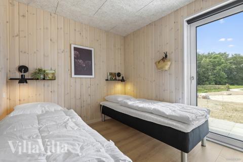 Eines der 7 Schlafzimmer im Luxusferienhaus Nr. 826