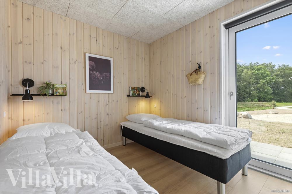 Eines der 7 Schlafzimmer im Luxusferienhaus Nr. 826