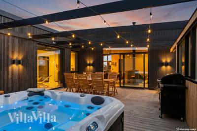 Diese schicke Haus mit Whirlpool Nr. 965 mit Platz für 12 Personen liegt in Nordjütland
