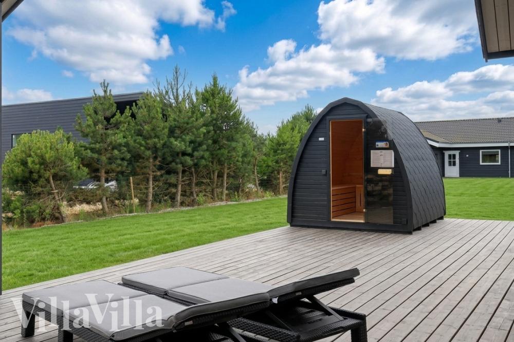 Das Luxusferienhaus Nr. 976 hat eine tolle Terrasse, die mit hochwertigen Gartenmöbeln für 14 Personen ausgestattet ist.