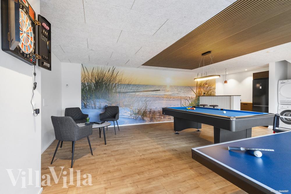 Neben den vielen schönen Stunden, die man im Poolbereich des Hauses verbringen kann, bietet das Luxusferienhaus 968 auch Spielevergnügen bei Billard/Tischtennis und Darts