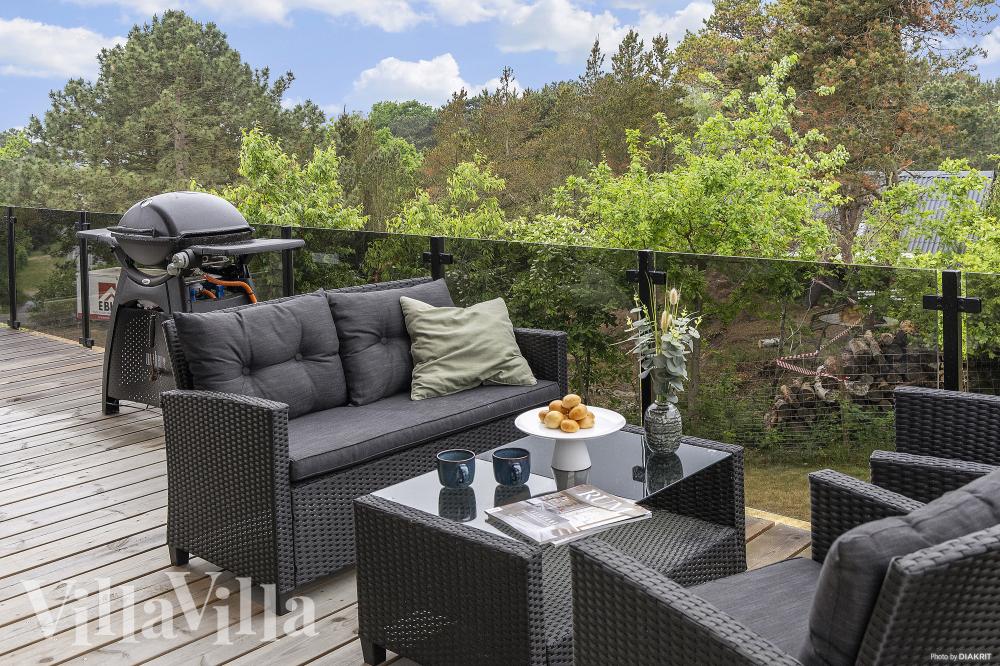 Genießen Sie einen Grillabend auf der Terrasse des Luxusferienhauses Nr. 968 in Ostjütland