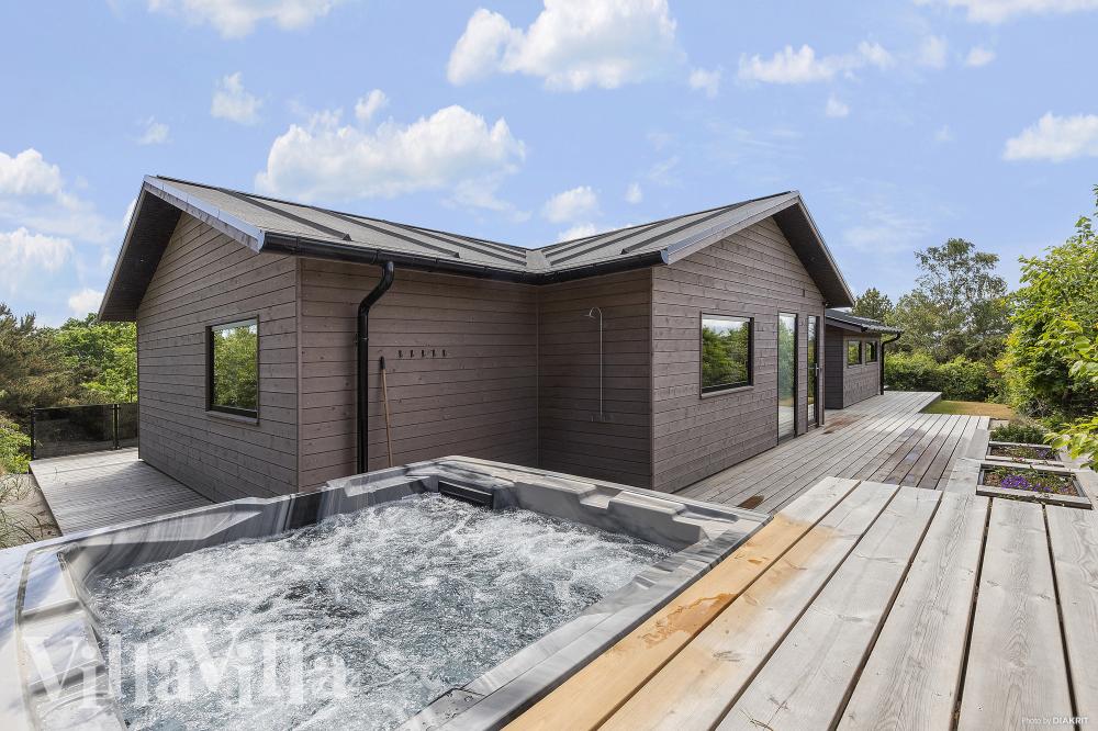 Das Luxusferienhaus Nr. 968 bietet u. a. einen tollen Whirlpool