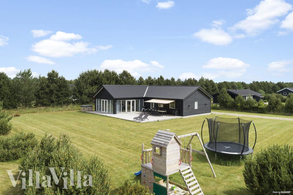 Das Luxusferienhaus Nr. 969 hat eine tolle Terrasse, die mit hochwertigen Gartenmöbeln für 12 Personen ausgestattet ist.
