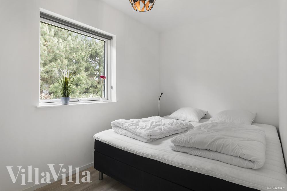 Eines der 6 Schlafzimmer im Luxusferienhaus Nr. 969