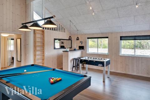 Neben den vielen schönen Stunden, die man im Poolbereich des Hauses verbringen kann, bietet das Luxusferienhaus 463 auch Spielevergnügen bei Billard/Tischtennis und Darts