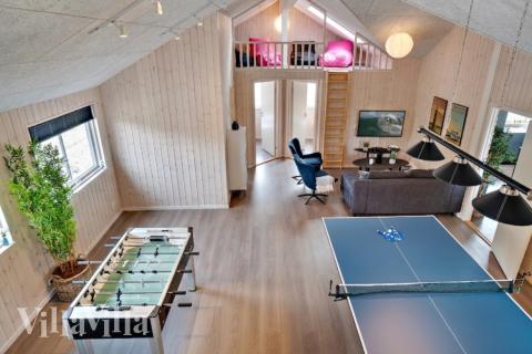 Das Luxusferienhaus 463 für 22 Personen hat einen großen Aktivitätsraum mit u. a. Billard und Darts
