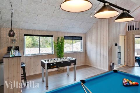 Aktivitätsraum im Luxusferienhaus Nr. 463 mit 8 Schlafzimmern und Platz für 22 Gäste.