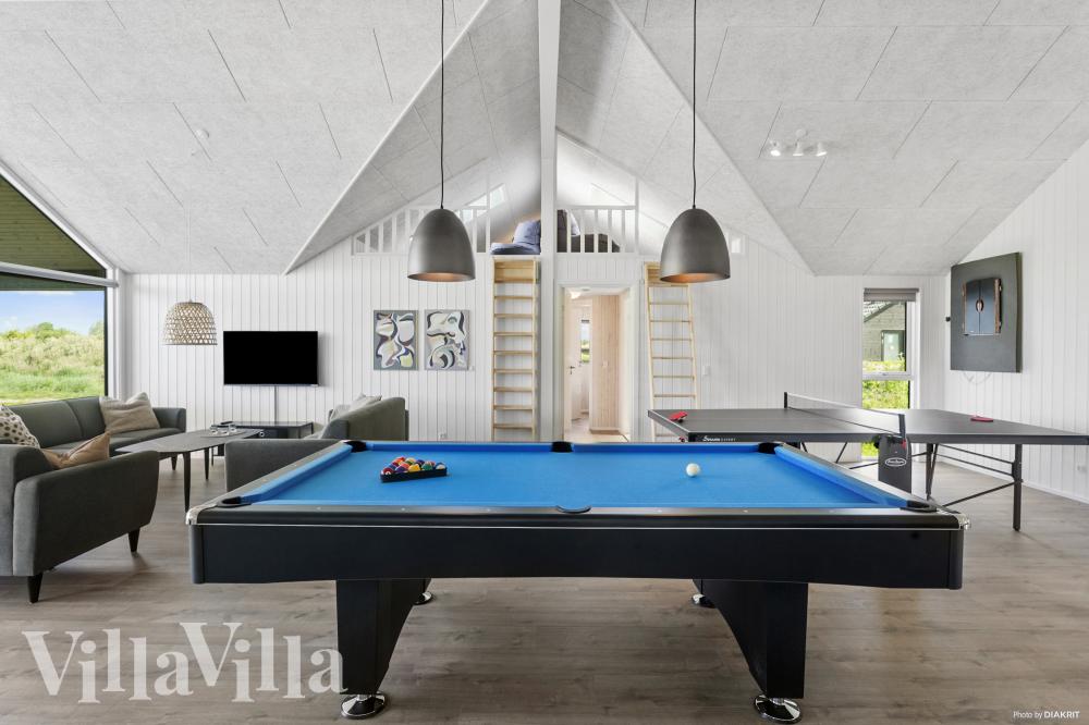 Das Luxusferienhaus 923 für 30 Personen hat einen großen Aktivitätsraum mit u. a. Billard und Darts
