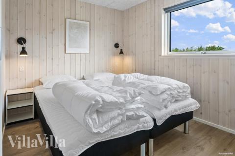 Eines der 12 Schlafzimmer im Luxusferienhaus Nr. 923