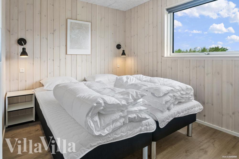 Eines der 12 Schlafzimmer im Luxusferienhaus Nr. 923
