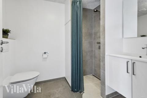 Eines der Badezimmer im Luxusferienhaus Nr. 923