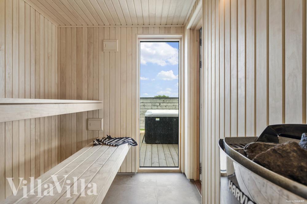Genießen Sie die heiße Sauna im Luxusferienhaus Nr. 923 für 30 Personen