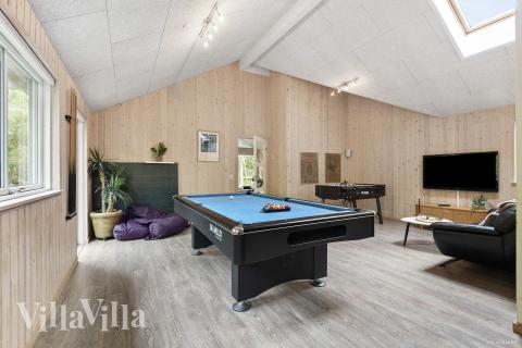 Neben den vielen schönen Stunden, die man im Poolbereich des Hauses verbringen kann, bietet das Luxusferienhaus 313 auch Spielevergnügen bei Billard/Tischtennis und Darts